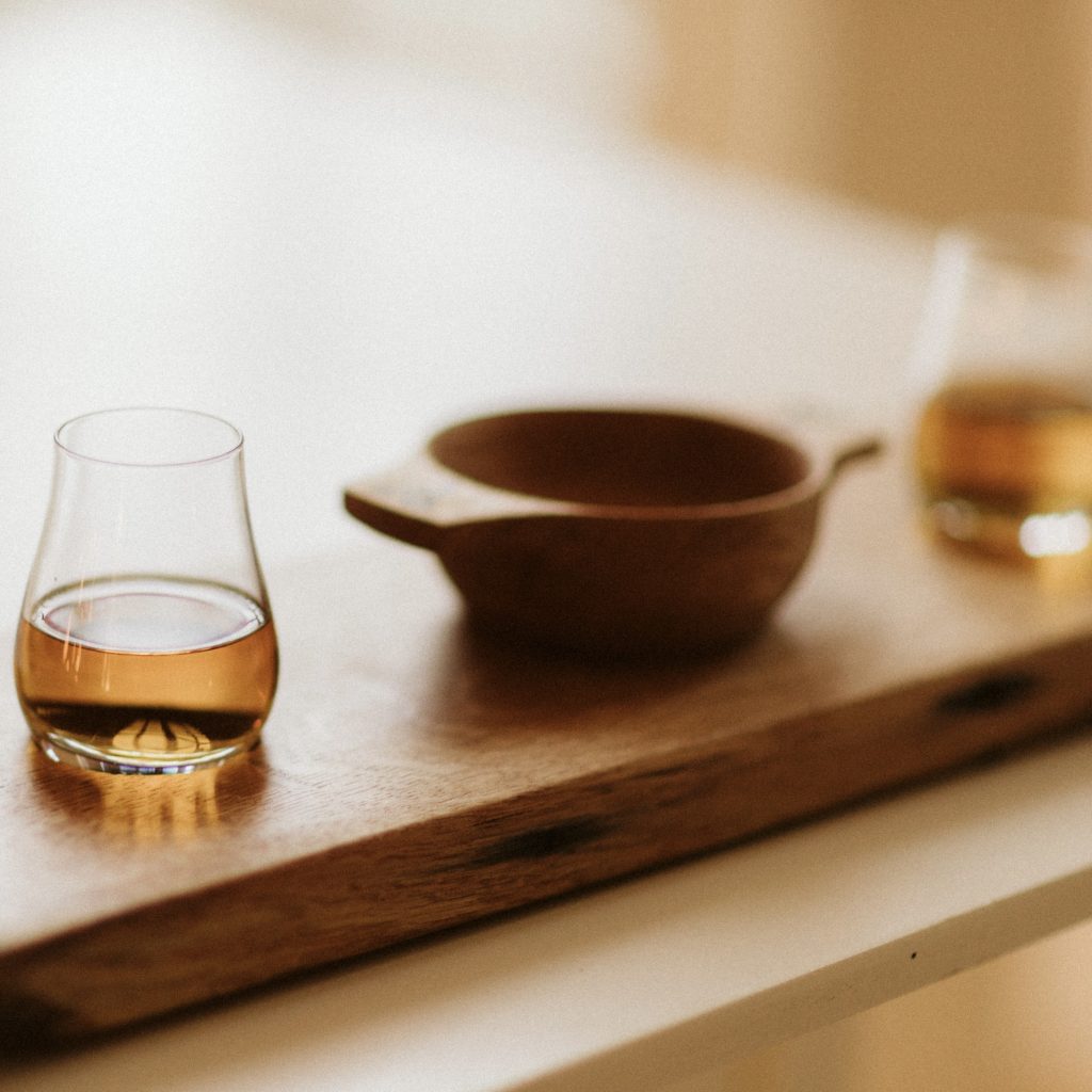 Handcrafted wooden quaich and tray with two spey glasses. Designed as a wedding centrepiece these have been set on a reclaimed oak whisky barrel lid