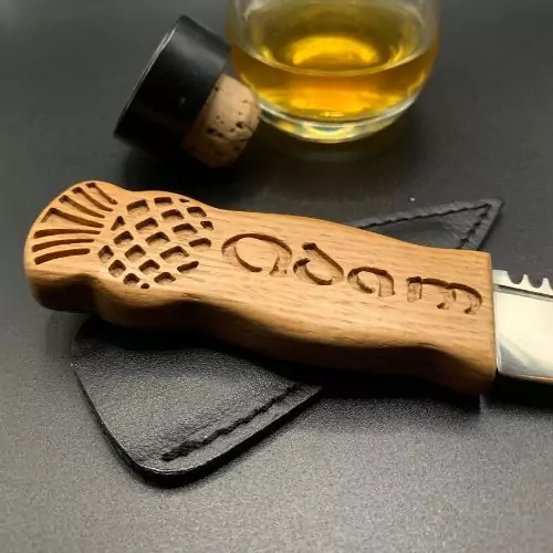 Engraved and personalised sgian dubh handcrafted from a reclaimed and recycled oak whisky stave
