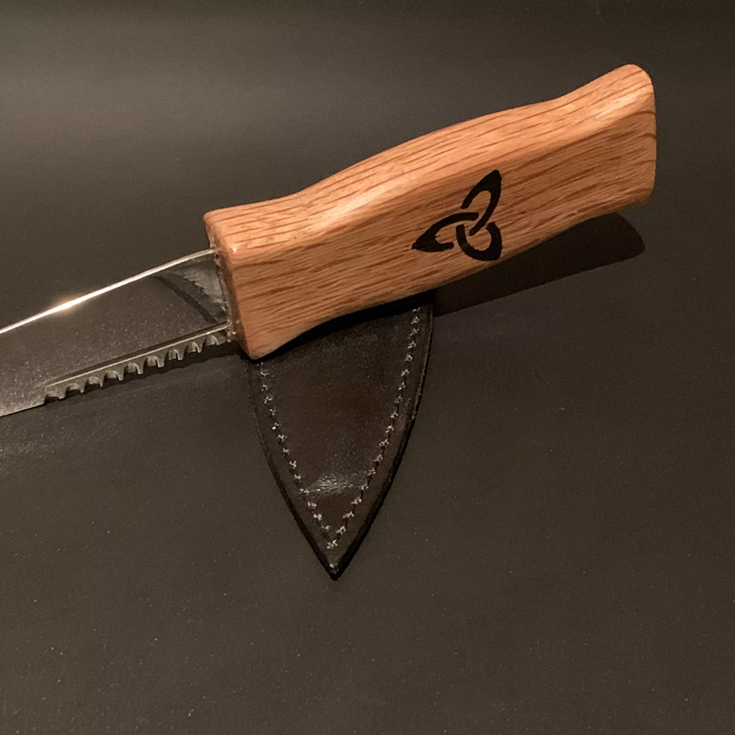 A traditional Oak Sgian Dubh handcrafted from an authentic reclaimed Scottish whisky stave