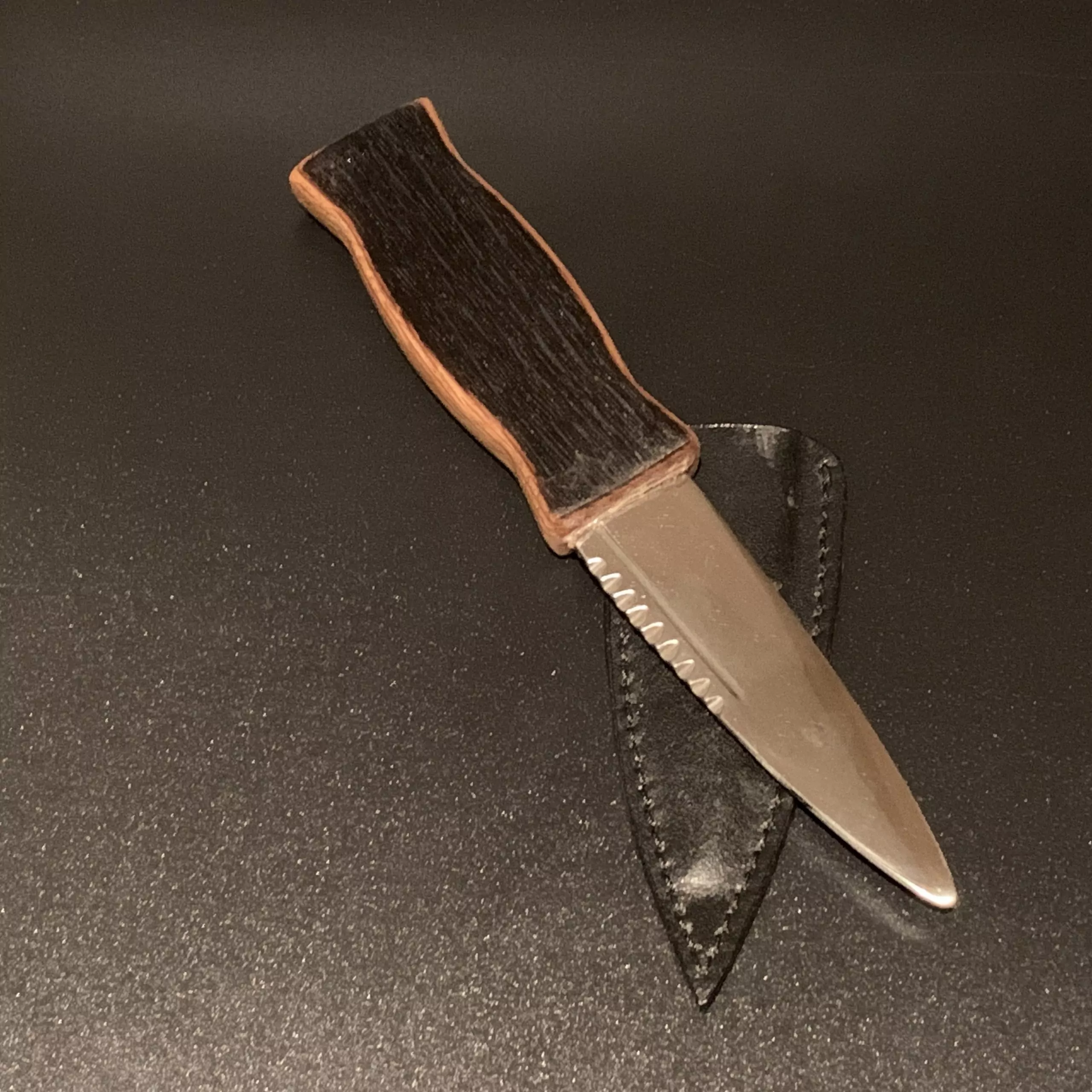 A traditional Oak Sgian Dubh handcrafted from an authentic reclaimed Scottish whisky stave