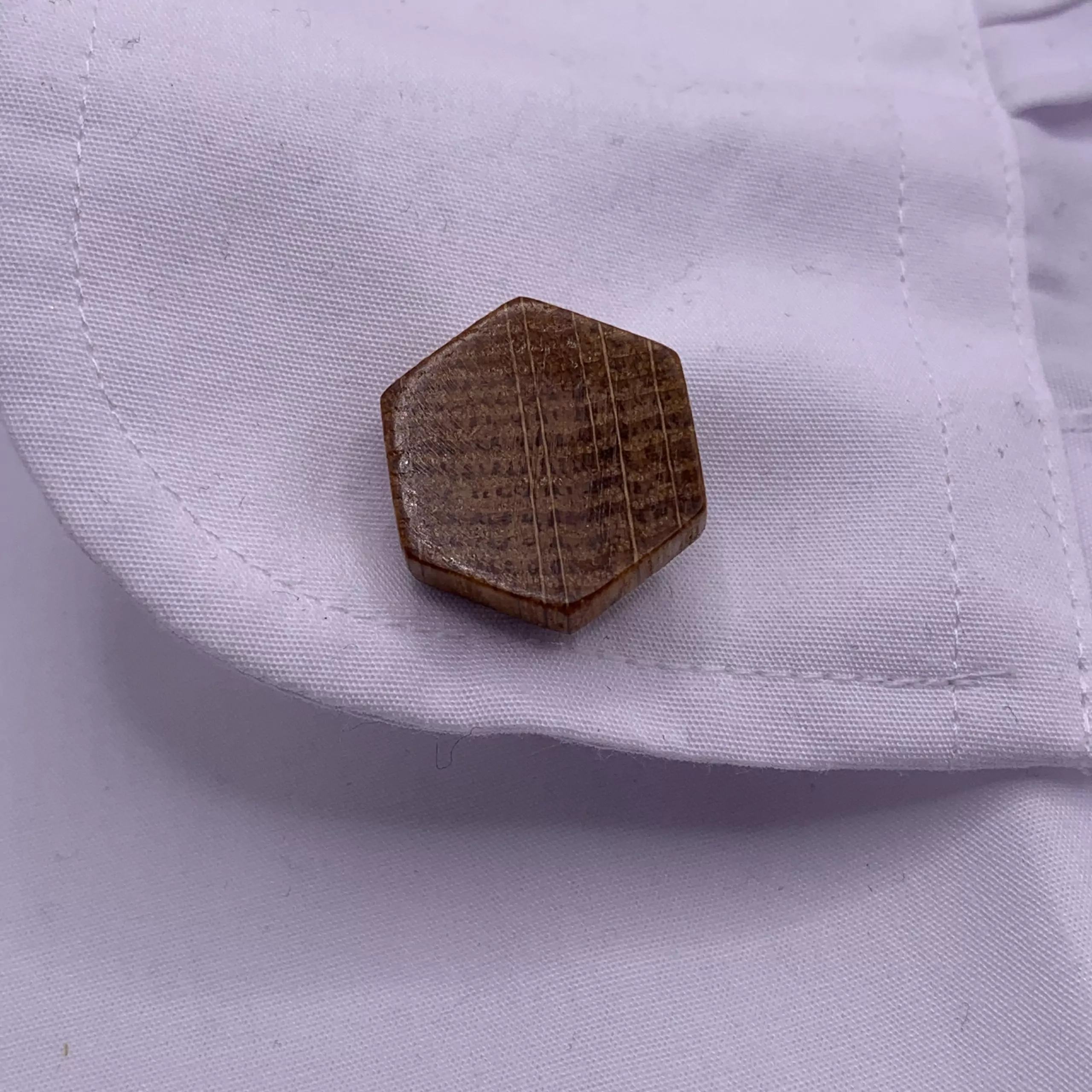 Hexagonal shaped oak cufflinks handcrafted from a reclaimed whisky barrel stave