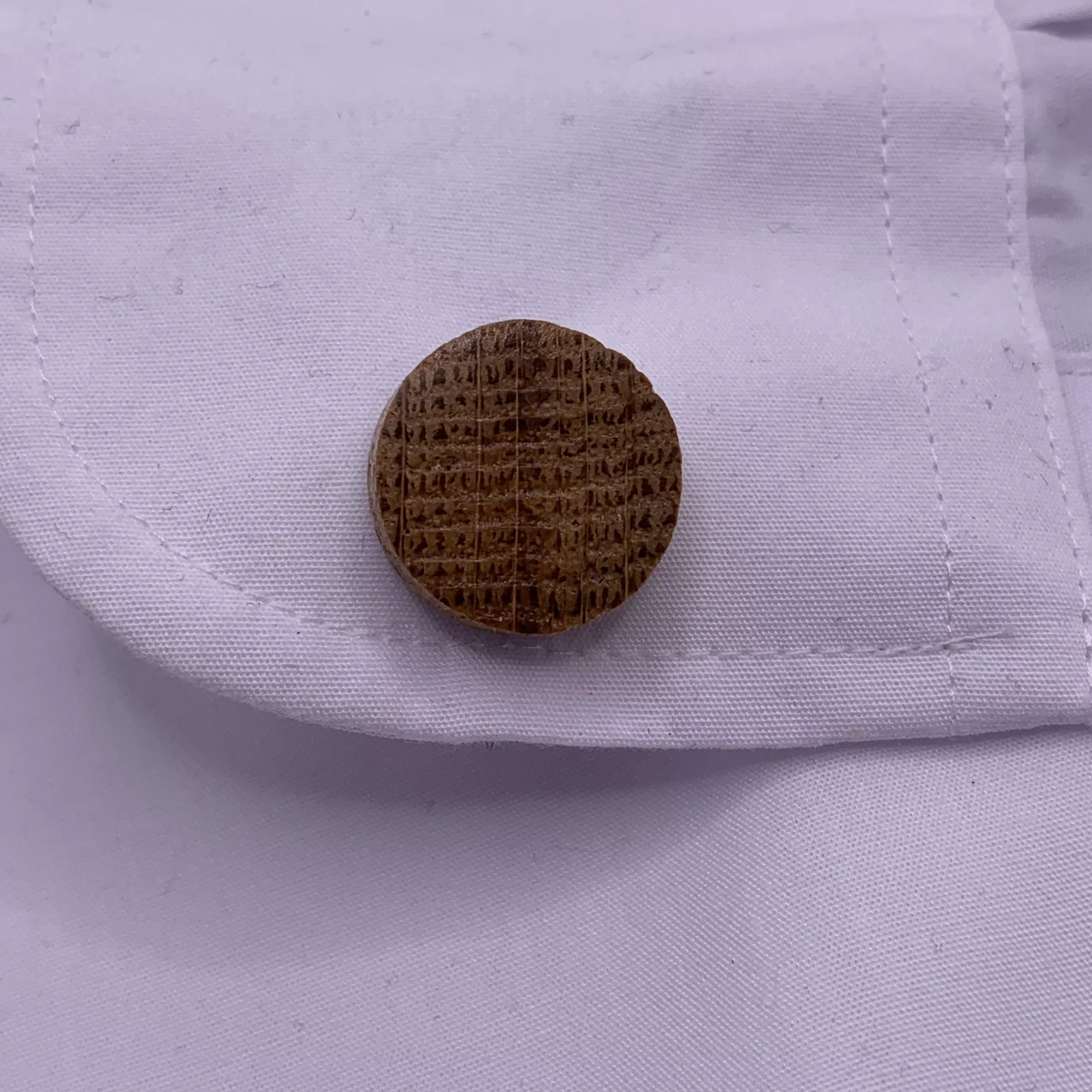 Circular shaped oak cufflinks handcrafted from a reclaimed whisky barrel stave
