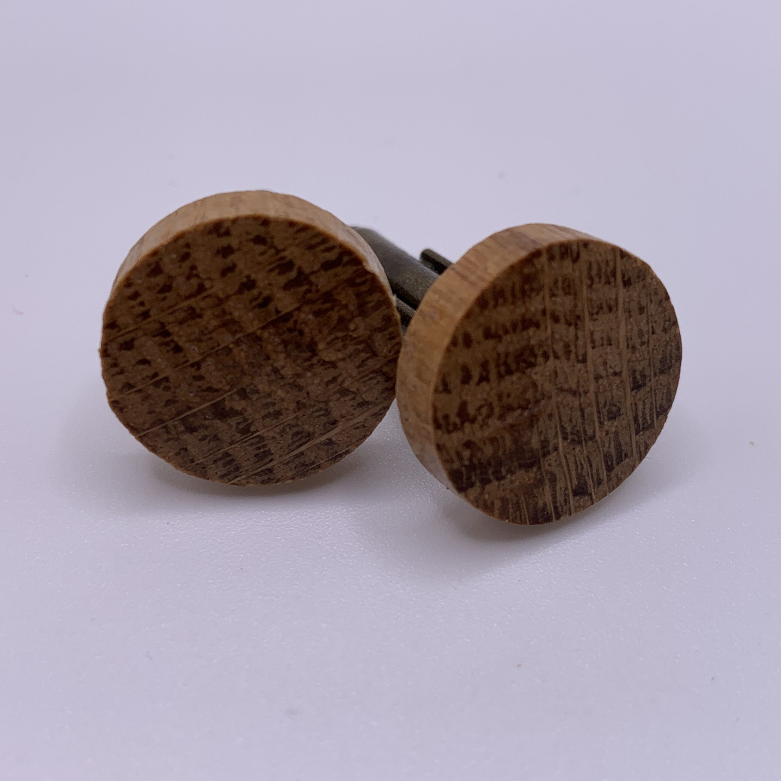 Circular shaped oak cufflinks handcrafted from a reclaimed whisky barrel stave