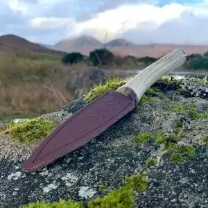 Handcrafted Native Scottish Red Deer antler sgian dubh finished with cow horn overlooking Glencoe,Scotland