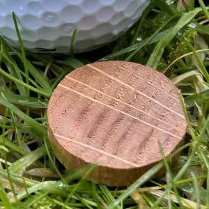 Personalised golf ball marker handcrafted from reclaimed whisky oak
