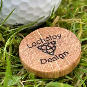 Oak golf ball marker handmade from an authentic Scottish whisky barrel, personalised with custom Lochsloy Design logo