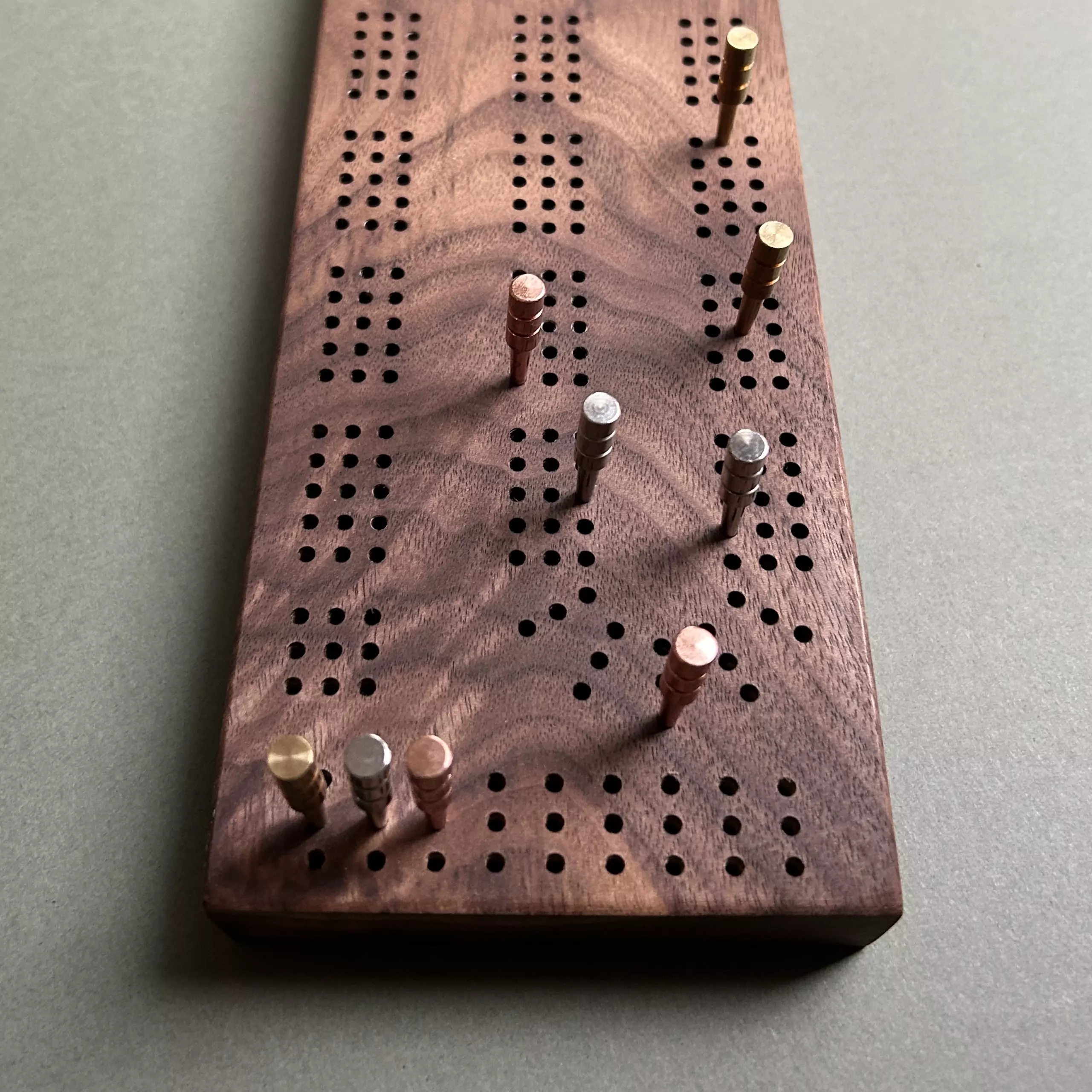 Stunning 3 track cribbage board handcrafted from walnut wood