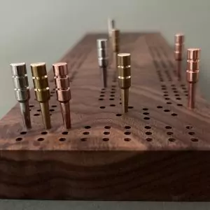 Stunning 3 track cribbage board handcrafted from walnut wood