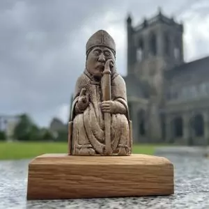 Handcast and hand finished Lewis Chess piece on reclaimed whisky oak plinth