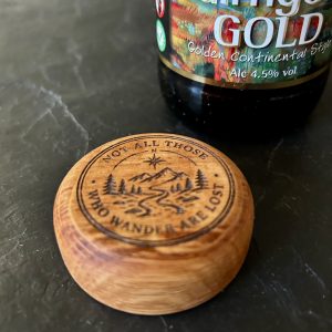 Circular palm bottle opener handcrafted from reclaimed Scottish Whisky oak and featuring customised engraving