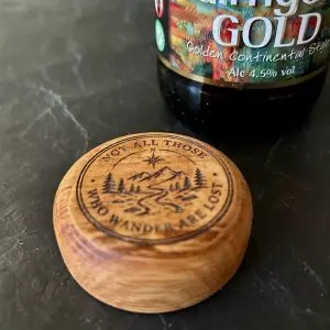 Circular palm bottle opener handcrafted from reclaimed Scottish Whisky oak and featuring customised engraving